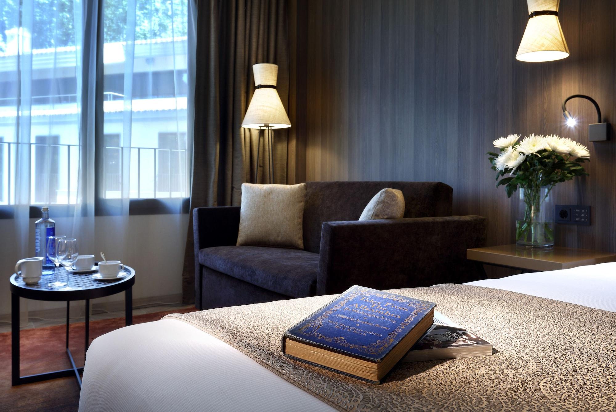 Aurea Washington Irving By Eurostars Hotel Company Granada Bagian luar foto A room at the hotel