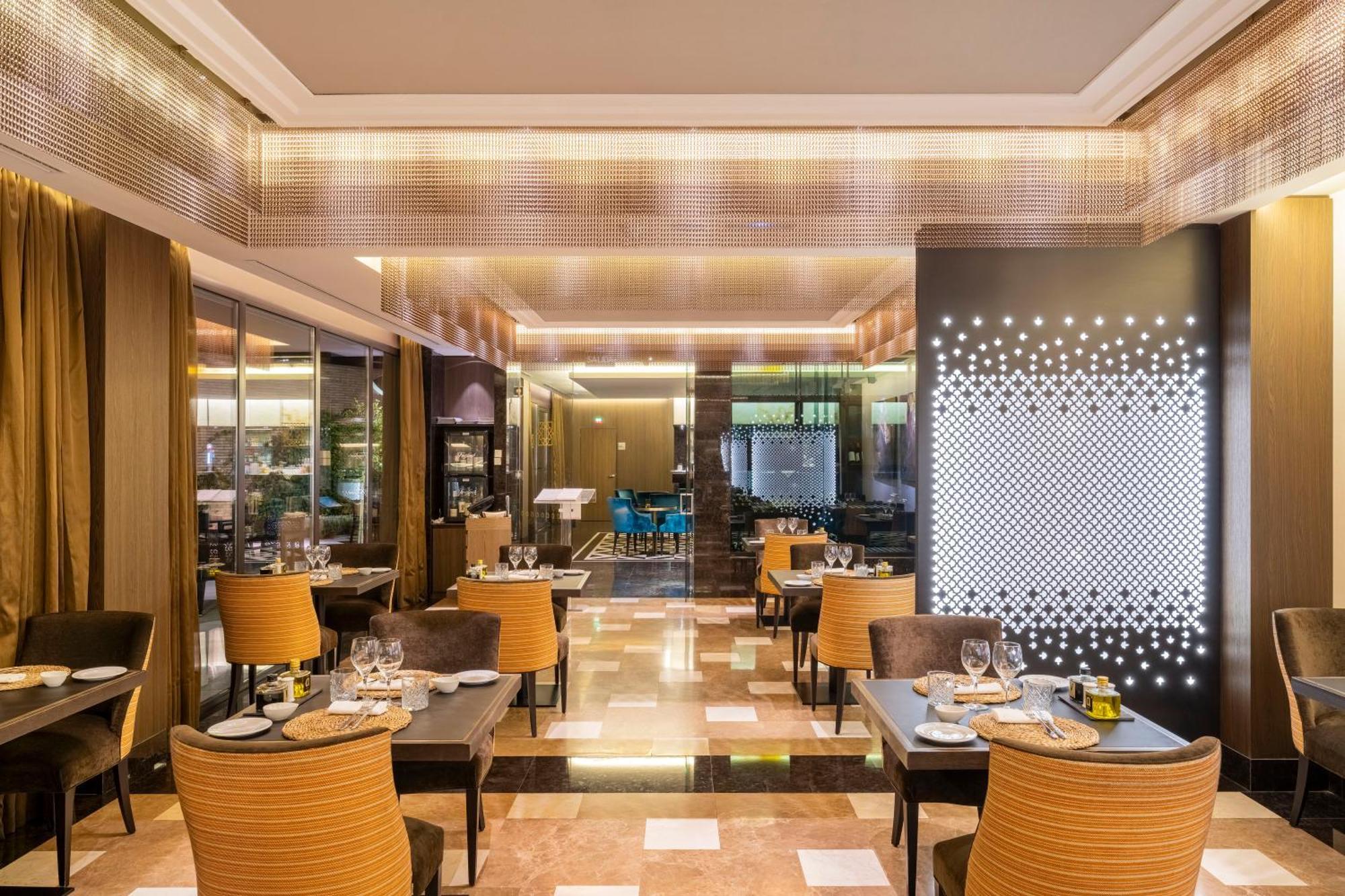 Aurea Washington Irving By Eurostars Hotel Company Granada Bagian luar foto The restaurant