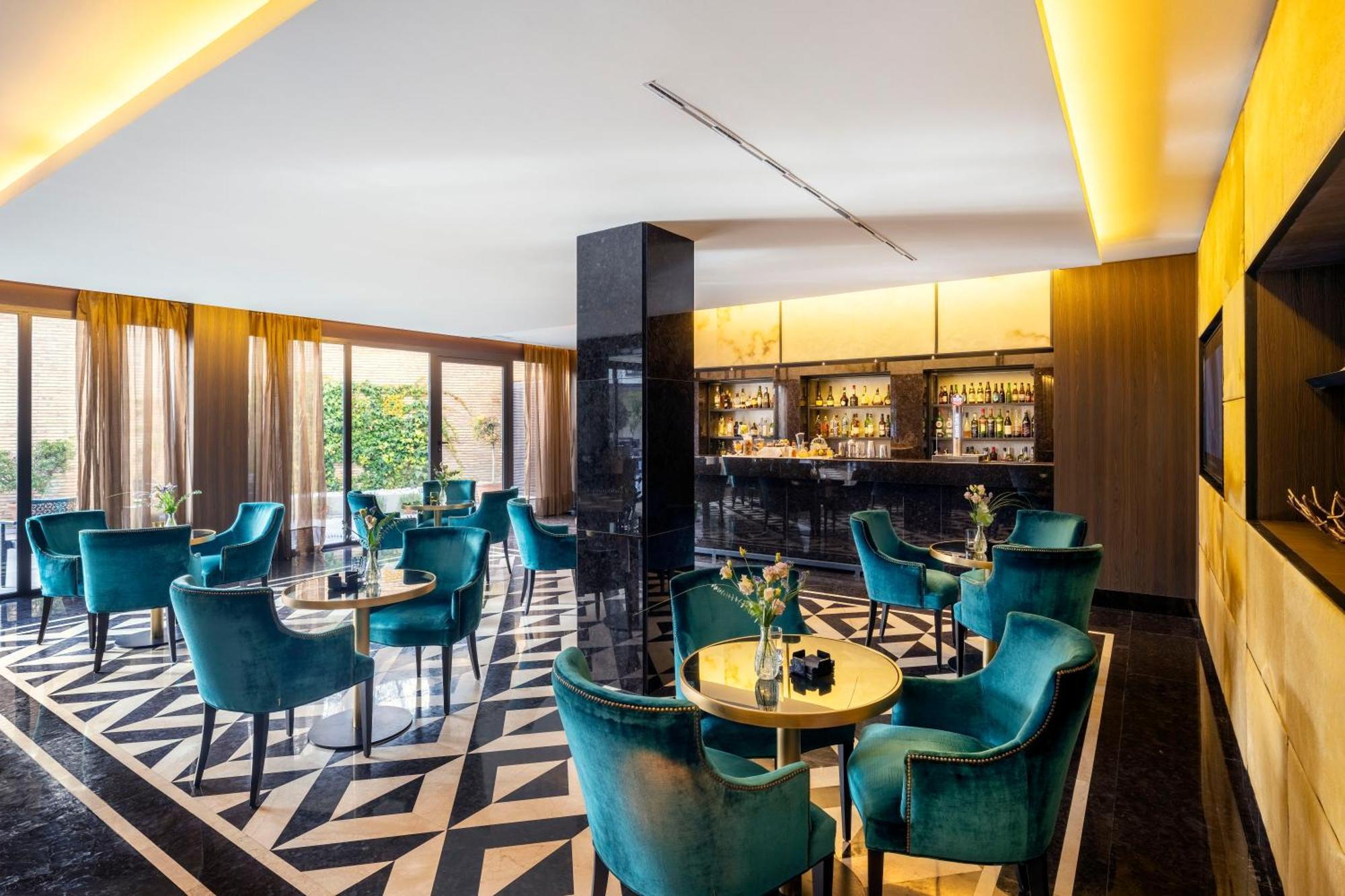 Aurea Washington Irving By Eurostars Hotel Company Granada Bagian luar foto The Bar